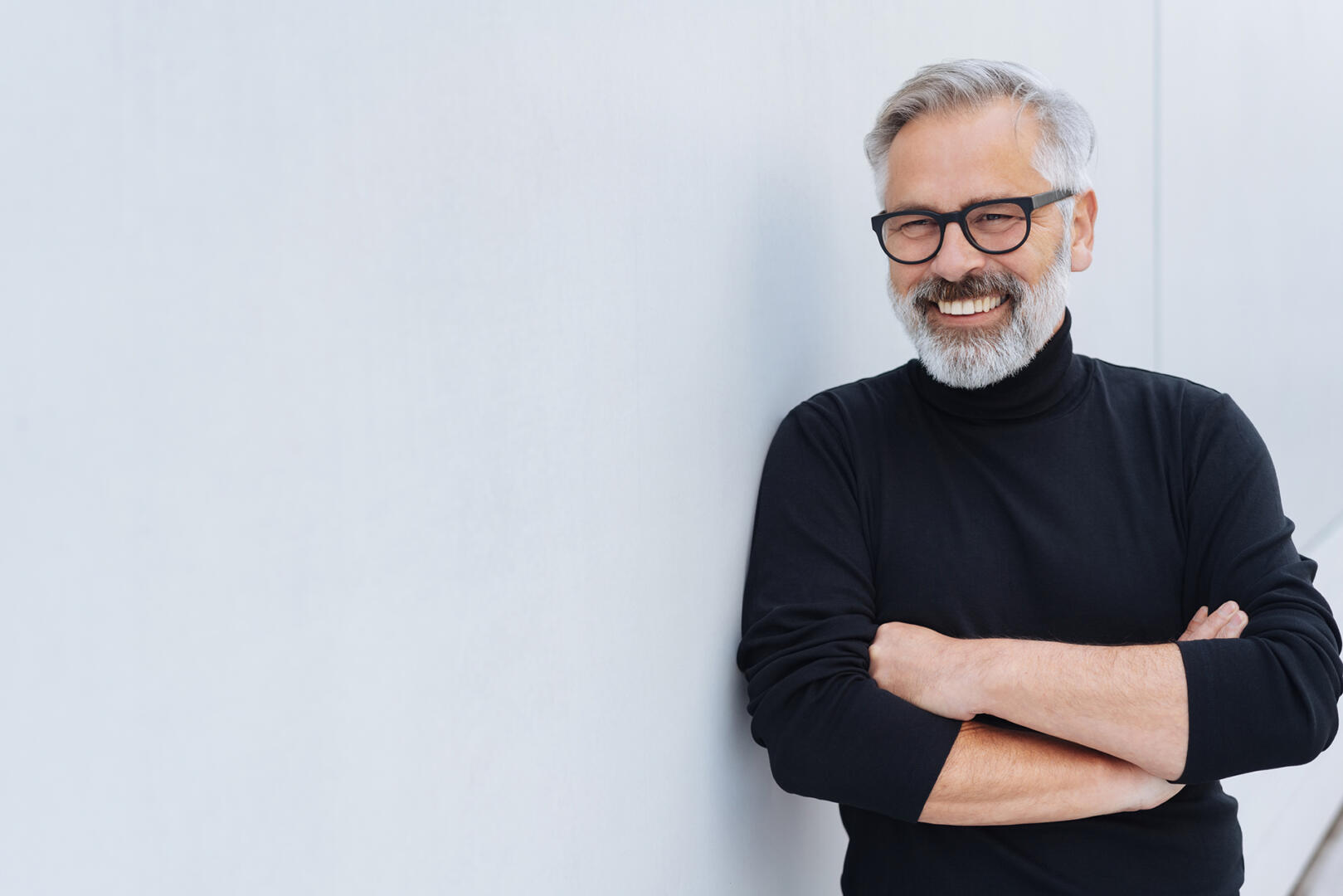 Relaxed self assured senior man with beard